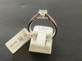 a picture of a diamond ring with a price tag attached to it