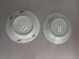 two plates that are sitting on a table