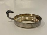 an image of a silver plate with a handle on it