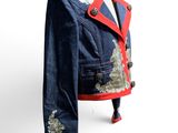 an image of a blue jacket with red trimmings on a mannequin