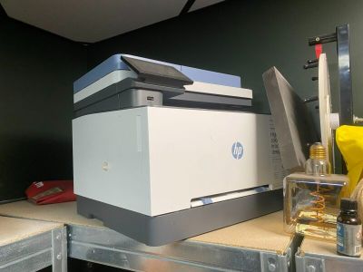 a printer that is sitting on top of a desk