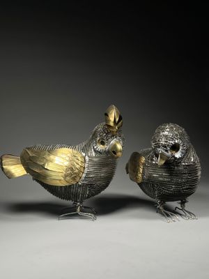 paire de figurines d'oiseaux en argent et en or