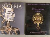 two books on a table with one of them in gold and the other in black