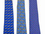three neck ties are lined up against a white background