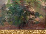 a picture of a painting of a tree in a gold frame