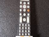 a remote control that is sitting on a table