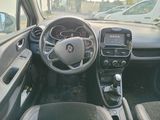 a dashboard of a car with a steering wheel and dashboard controls