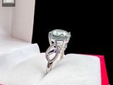 a ring that is sitting in a box on a table