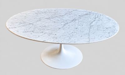 an image of a white marble table with a white pedestal