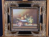 a picture of a painting of a bowl of fruit on a table