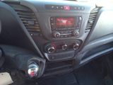 a dashboard of a car with a radio and a steering wheel