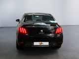 a black car that is parked in a room