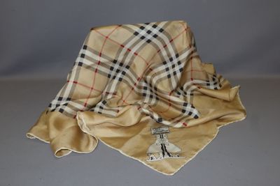 a blanket with a picture of a woman on it on a table
