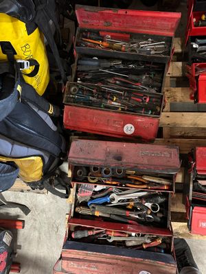 a lot of tools that are sitting on a pallet