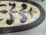 a table that has a tile design on it