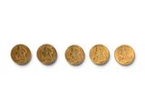 a group of five gold coins on a white surface