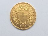 an image of a gold coin on a white surface