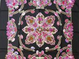 an image of a black square scarf with pink flowers on it