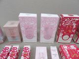 a lot of different types of perfumes on the table