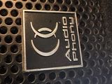 a close up of a sign on a metal surface