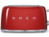 red toaster with the word smeg written on it