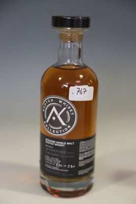 an image of a bottle of whisky sitting on a table