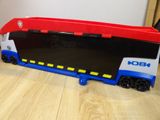 a toy truck that is sitting on the floor