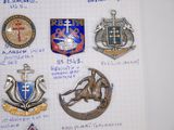 many different types of badges on a piece of paper