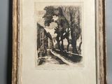 un dessin représentant une maison et des arbres dans un cadre en bois