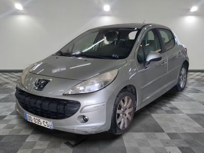 a picture of a silver car parked in a garage
