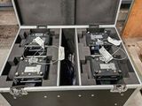 two suitcases that are open on the ground