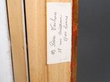 a close up of a book with a sticker on it