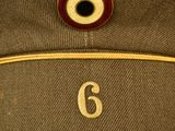 an image of a military hat with the number 6 on it