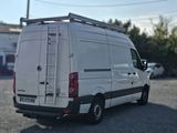 a white van that is parked in a parking lot