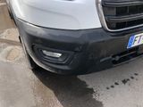 a white van parked on the side of the road