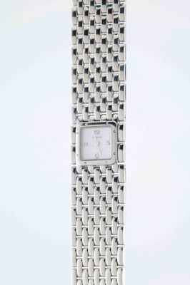an image of a woman ' s wrist watch on a white background