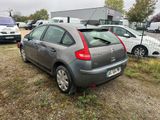 a car that is parked in a lot with other cars