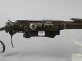 a toy gun that is on display on a table
