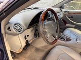 the interior of a car with a steering wheel and dashboard