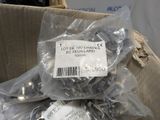 a bag of nuts in a box with a price tag