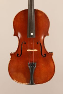 an old violin with a bow on a white background