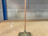 an image of a floor stand with a handle on it