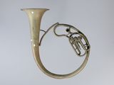a brass instrument that is sitting on a table