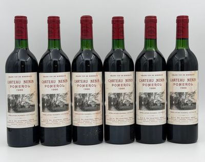 six bottles of red wine are lined up in a row