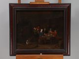 a picture of a painting on a easel with a dog in front of it
