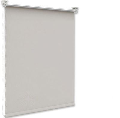 a close up of a white roller shade on a white wall