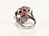 an image of a close up of a ring on a white surface