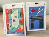pair of luggage tags with a map of paris and the arc de triopes