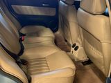the interior of a car with the door open and the seats down