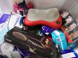 a pile of hair products in a box on the floor